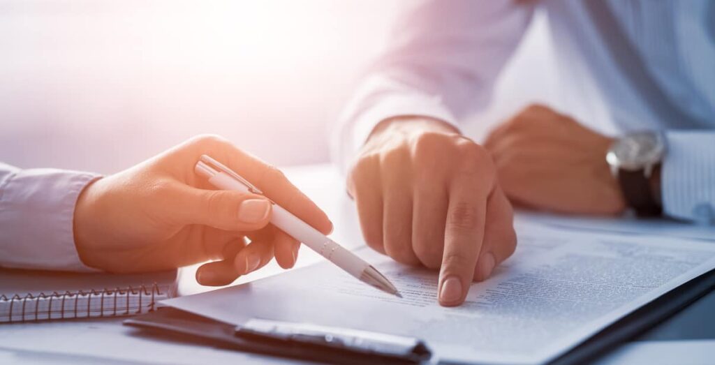 business people negotiating a contract.