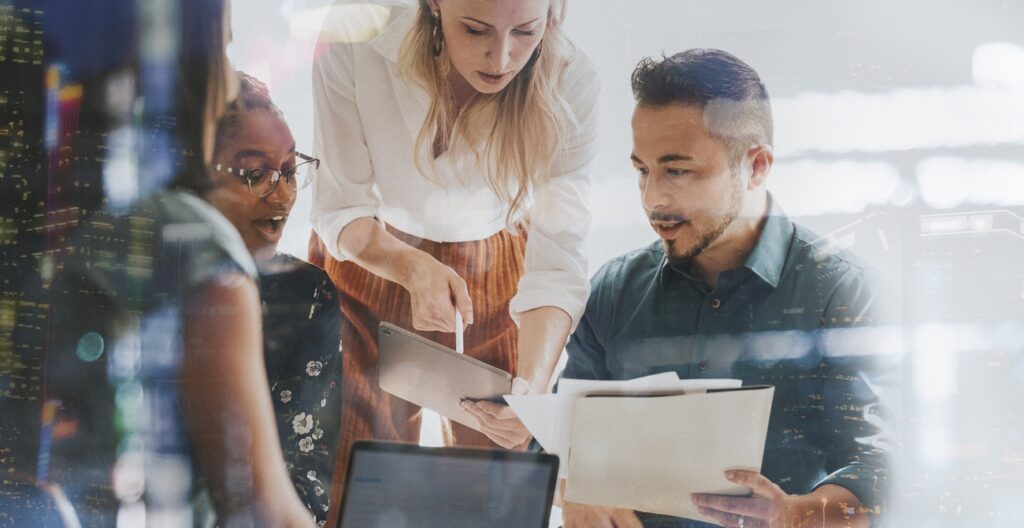 business people working with a digital tablet in a meeting