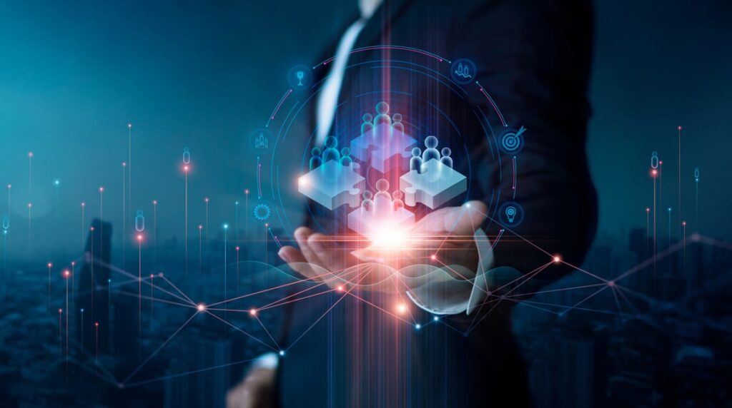 teamwork and partnership concept. businessman hold jigsaw puzzle pieces with teamwork icon. business solution. development. unity and cooperation, strategy and target of business growth.
