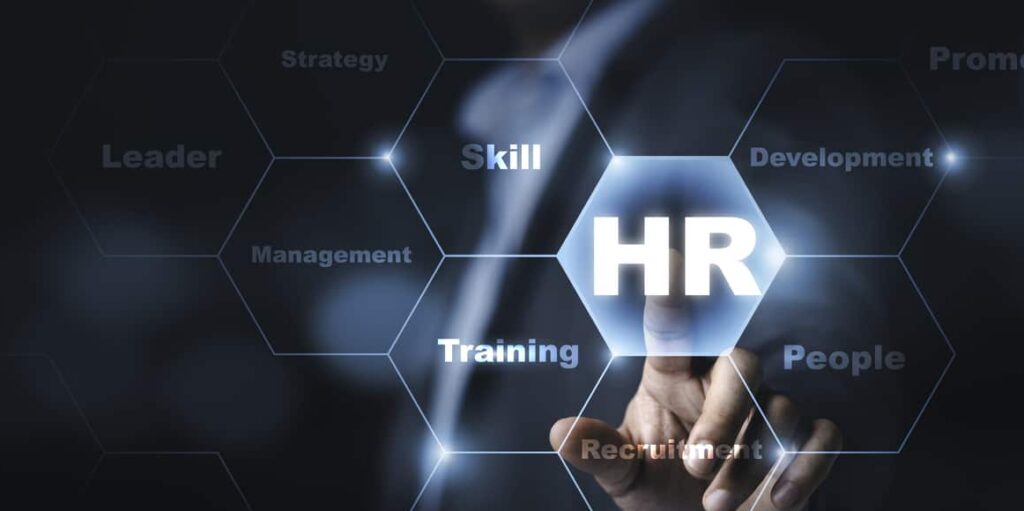 businessman touching to virtual screen with infographic and hr wording , human development and recruitment concept.