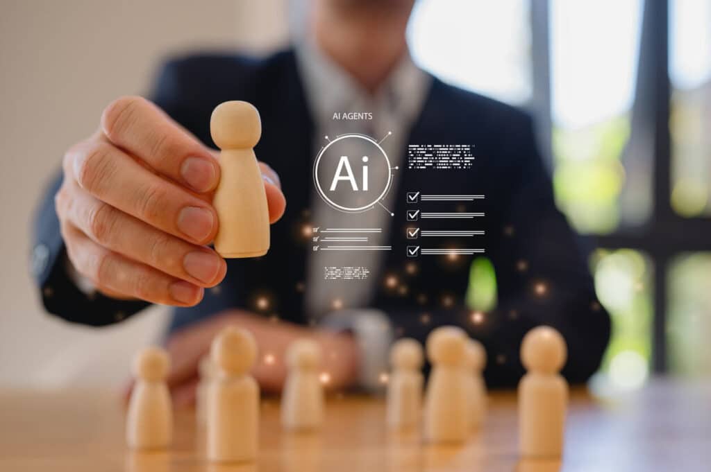 hr person moves chess piece with AI superimposed: people impact of technology